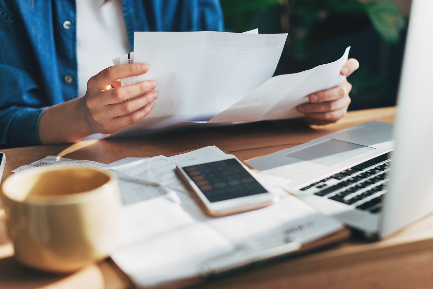 More than half of Americans are concerned about emergency expenses, according to a survey 3 May 8, 2025 7:22 am More than half of Americans are concerned about emergency expenses, according to a survey Woman using calculator and laptop