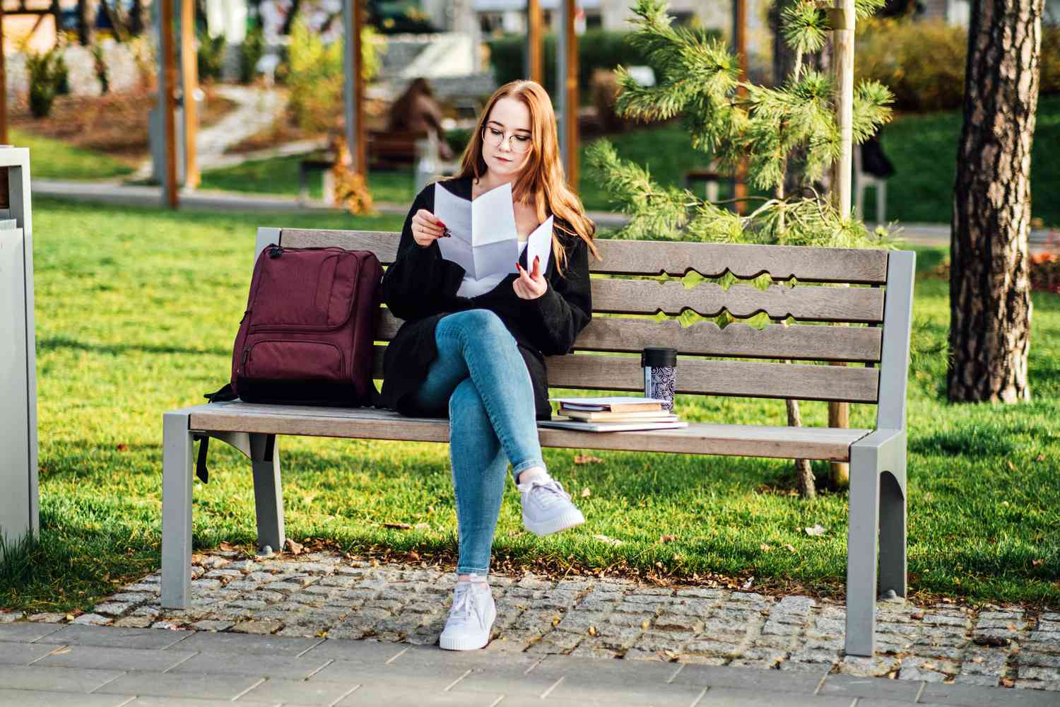 Three ways to avoid defaulting on your student loans before collection efforts begin 3 June 16, 2025 4:14 pm Three ways to avoid defaulting on your student loans before collection efforts begin Young student girl in glasses and with laptop and books reading letter outdoors.