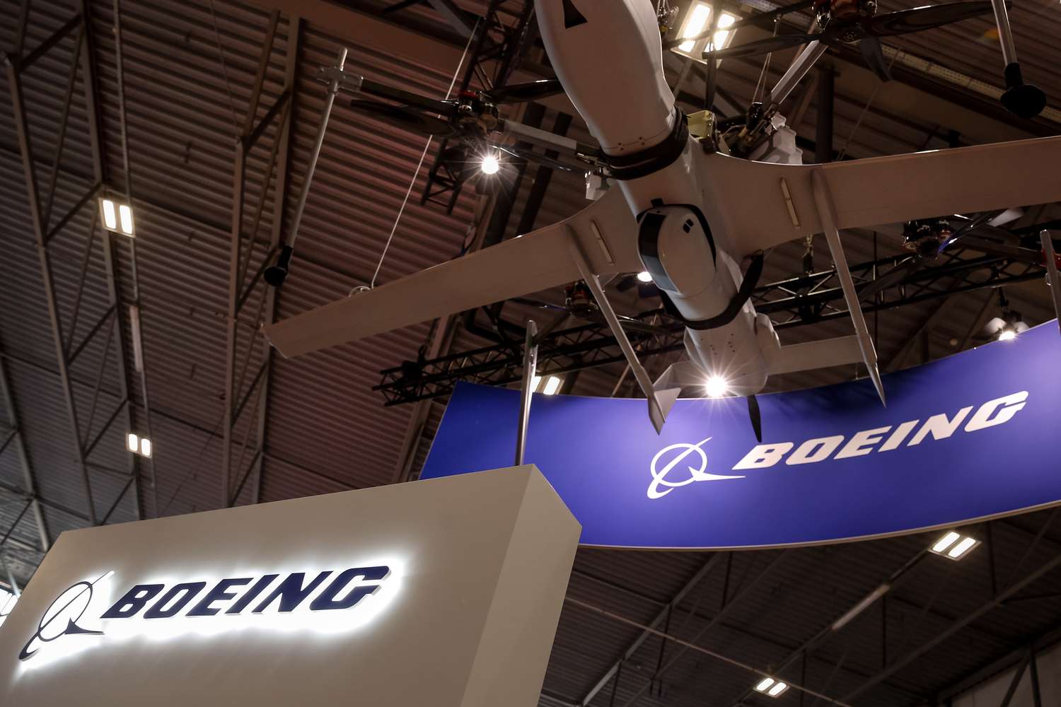 Boeing Tops Q1 Deliveries Estimates as Production Rises 3 June 14, 2025 11:14 am Boeing Tops Q1 Deliveries Estimates as Production Rises The Boeing logo is seen inside a conference center.