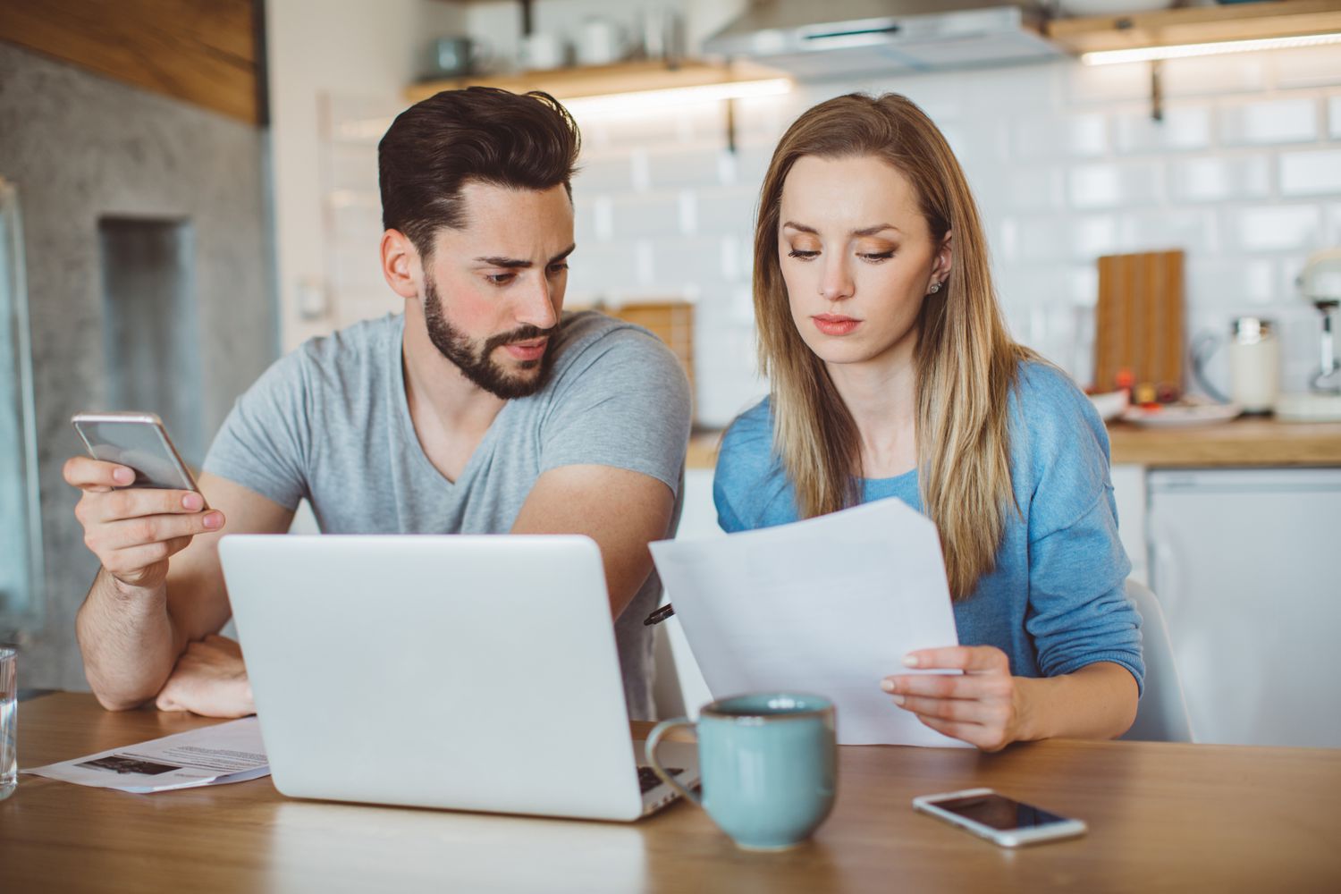 Rates for 30-Year Mortgages are Holding their Ground - March 27, 2025 3 June 15, 2025 5:59 pm Rates for 30-Year Mortgages are Holding their Ground - March 27, 2025 Young couple sitting in their kitchen and looking seriously at a mortgage document and a laptop