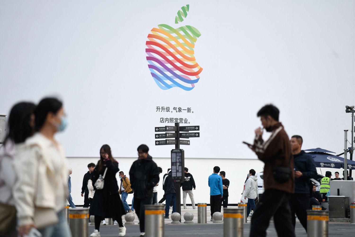 Apple Loses Title As World's Most Valuable Company Due to China Tariffs 3 July 23, 2025 2:49 am Apple Loses Title As World's Most Valuable Company Due to China Tariffs People walk past an Apple Store along a shopping street in Beijing.