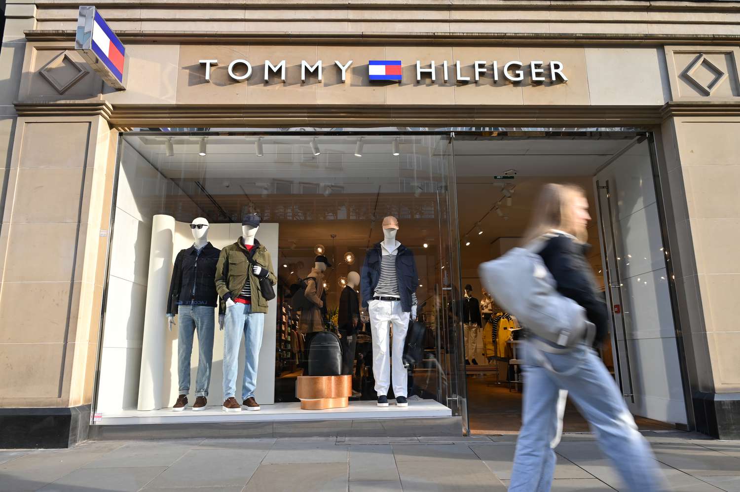 Top Stock Movers Now - Tesla, Supermicro PVH, and more 4 July 15, 2025 2:32 pm Top Stock Movers Now - Tesla, Supermicro PVH, and more People walk past a Tommy Hilfiger luxury fashion label store in London