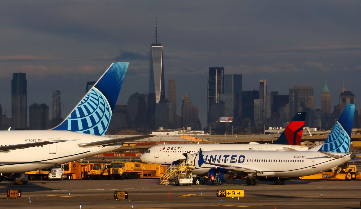 UBS analysts lower airline ratings amid fears of recession 3 June 14, 2025 11:46 am UBS analysts lower airline ratings amid fears of recession Planes from United and Delta Air Lines are seen on a runway, with the New York City skyline in the background.