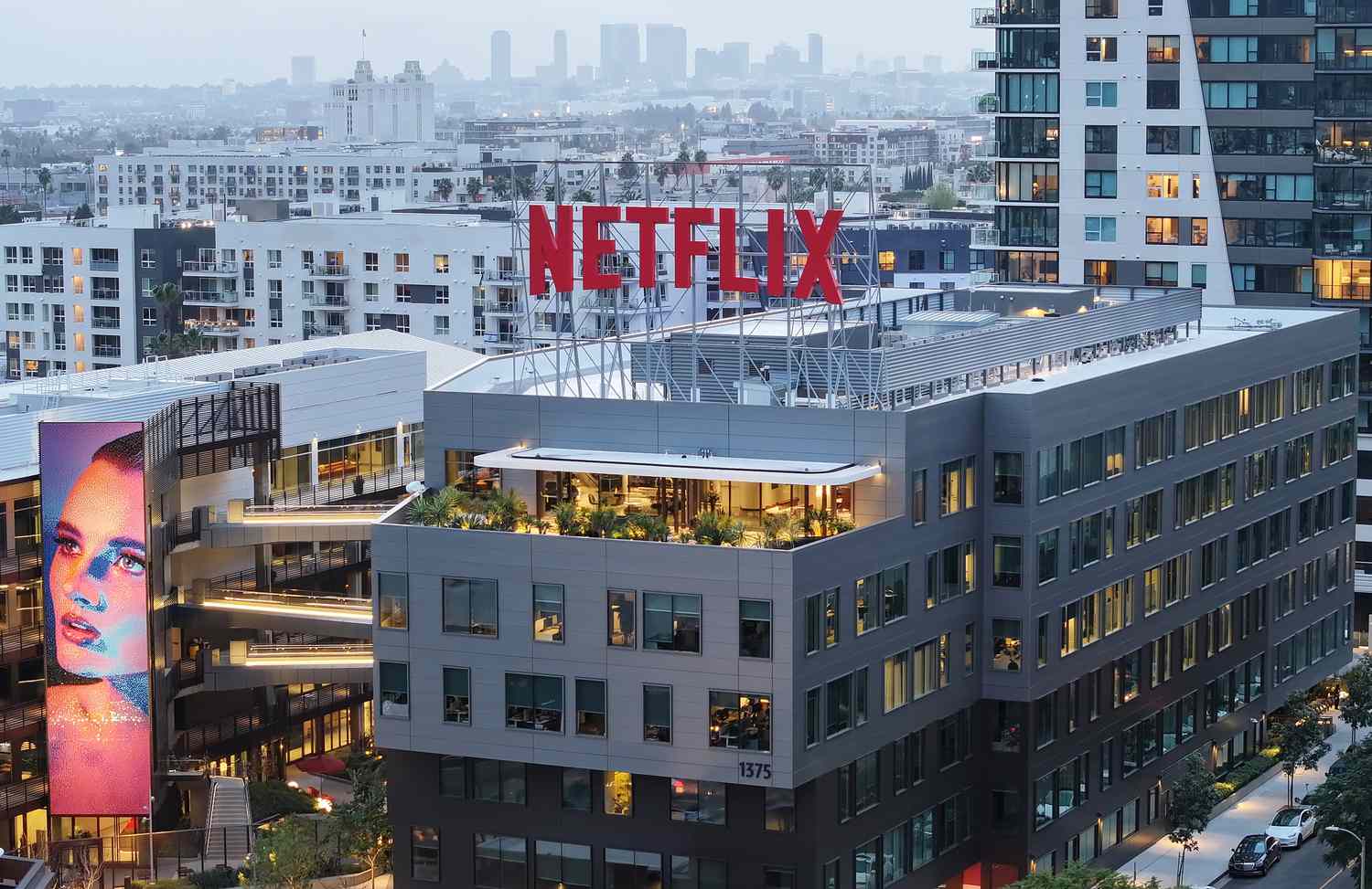 Netflix Stock Continues Recent Climb Before Earnings Release 3 July 11, 2025 6:13 pm Netflix Stock Continues Recent Climb Before Earnings Release The Netflix logo is displayed above an office building.