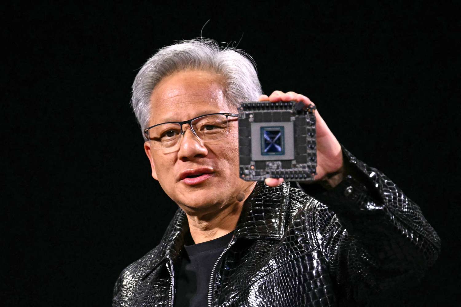 Nvidia AMD and Other Chip Stocks Drop as Trump Curbs China Exports 3 July 29, 2025 9:44 am Nvidia AMD and Other Chip Stocks Drop as Trump Curbs China Exports Nvidia CEO Jensen Huang holds a chip at CES.