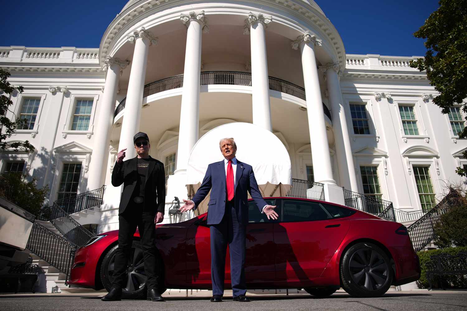 Tesla Stock Drops as Q1 Deliveries fall Short of Estimates 3 May 8, 2025 10:57 pm Tesla Stock Drops as Q1 Deliveries fall Short of Estimates Elon Musk and President Trump in front of a Tesla and the White House on March 11.