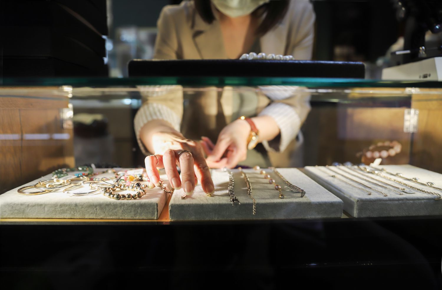 Redfin says that Americans are pulling back from plans to make large purchases. 3 June 14, 2025 11:37 am Redfin says that Americans are pulling back from plans to make large purchases. A stock image of a jewelry-store worker and a case of products on a counter.