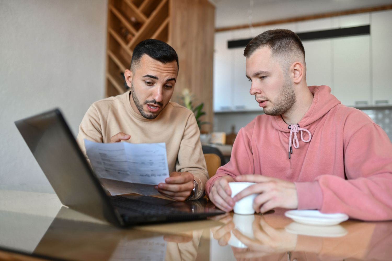A survey says that workers are saving less and dipping into retirement due to economic pressures. 4 August 29, 2025 8:10 pm A survey says that workers are saving less and dipping into retirement due to economic pressures. Two people doing paperwork at a laptop at home