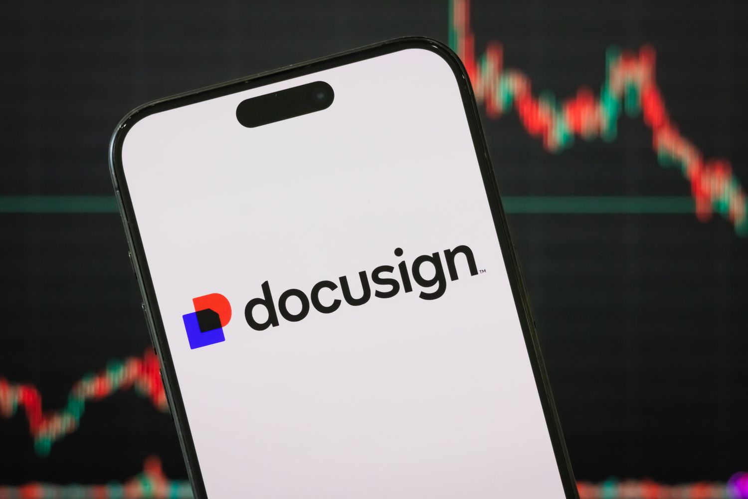 Docusign Inventory Jumps as Outcomes Prime Estimates on 'Speedy Traction' of AI Platform 3 April 19, 2025 11:08 pm Docusign Inventory Jumps as Outcomes Prime Estimates on 'Speedy Traction' of AI Platform The red and blue Docusign logo is seen on a phone screen, with a stock chart in the background.