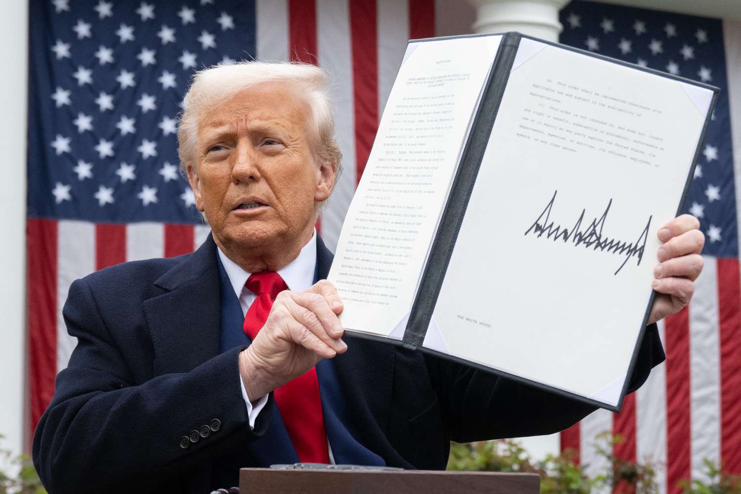 Stocks Drop After Hours after Trump Announces Sweeping Tariffs 3 July 15, 2025 9:02 pm Stocks Drop After Hours after Trump Announces Sweeping Tariffs US President Donald Trump holds a signed executive order after delivering remarks on reciprocal tariffs during an event in the Rose Garden.