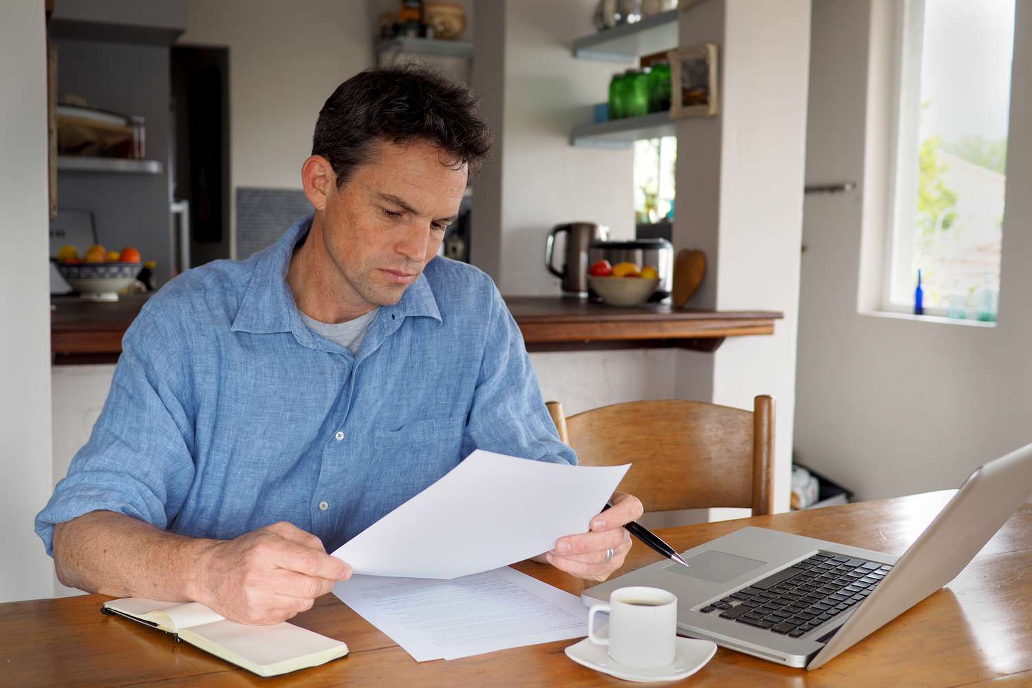 Best Places to park your savings as the Fed rate stays high 3 June 11, 2025 12:30 am Best Places to park your savings as the Fed rate stays high Man in his 40s sitting in his kitchen and looking at financial documents and a laptop